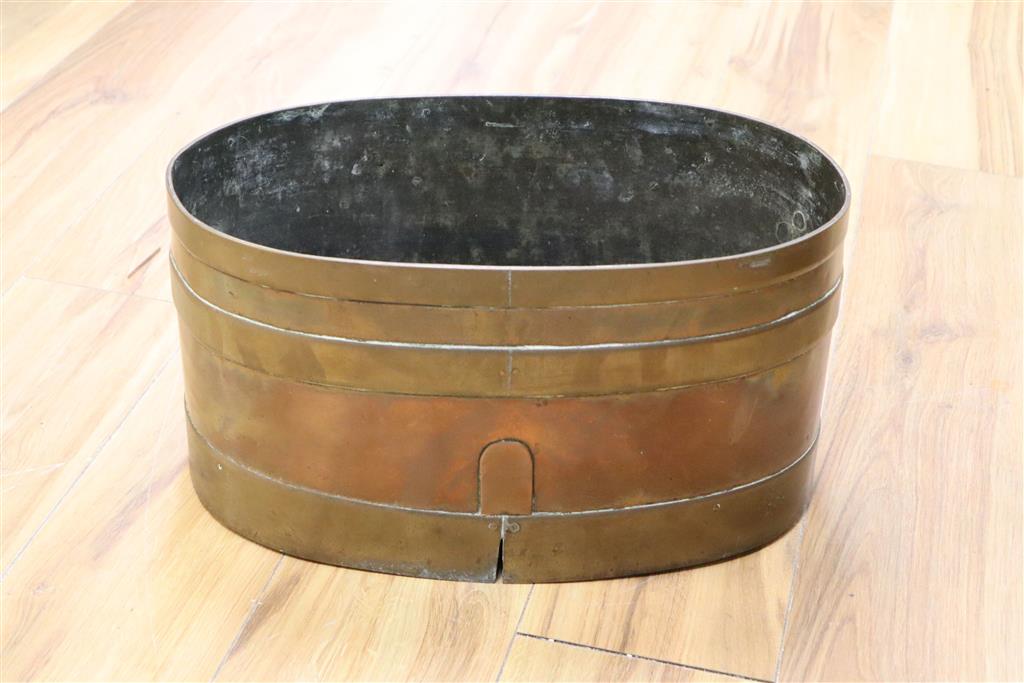 An early 19th century copper and brass bound log bin, length 43cm